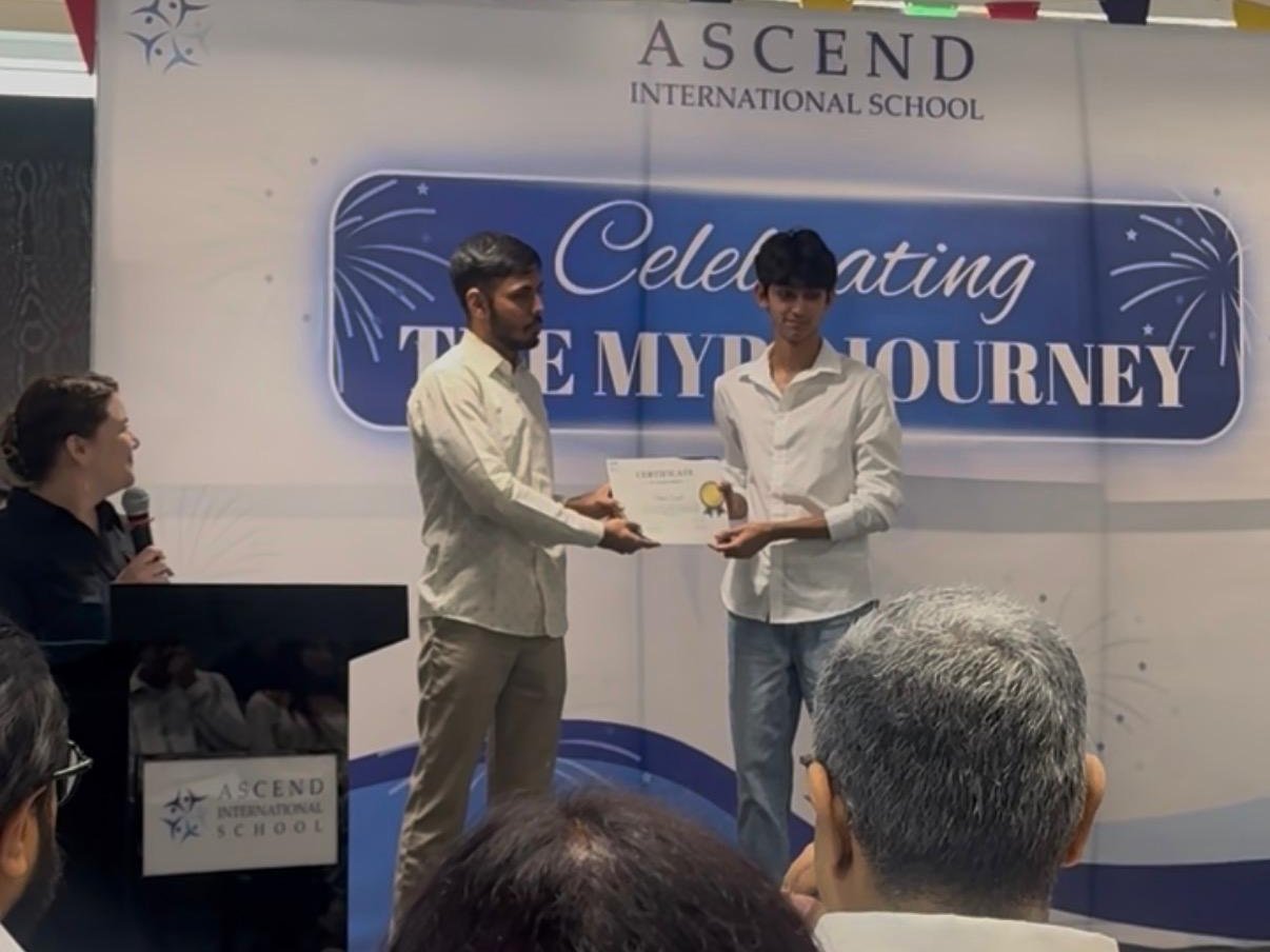 Receiving the MYP Personal Project award on stage